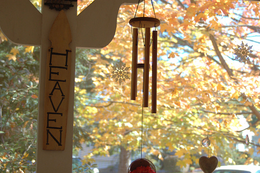 Photo of leaves and windchimes takein in New Hampshire during the fall.