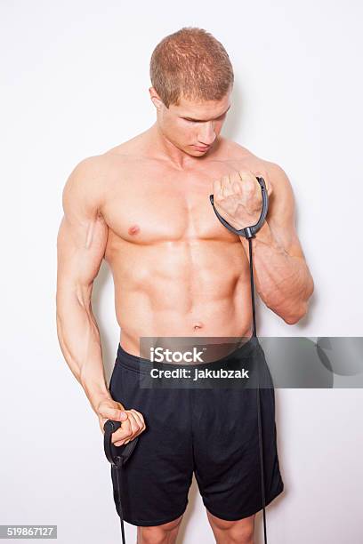 Young Man With Muscular Body Doing Fitness Exercise Without Shi Stock Photo - Download Image Now