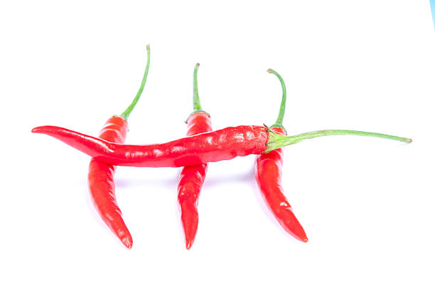 istock red hot chili pepper isolated on a white background 519867573