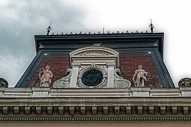 istock Facade on classical building with ornaments and sculptures 519867685