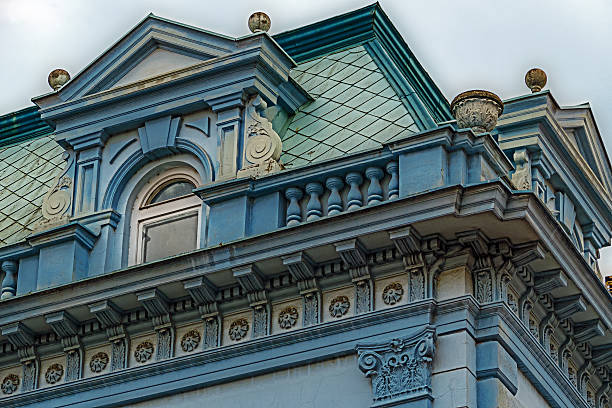 istock Facade on classical building with ornaments and sculptures 519867699