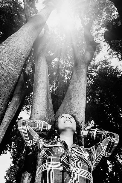 istock Young women looking up sun 519868122