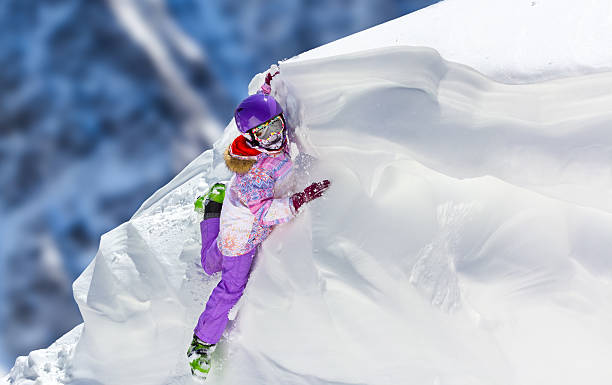 istock Little Girl playing in the snow 519868459