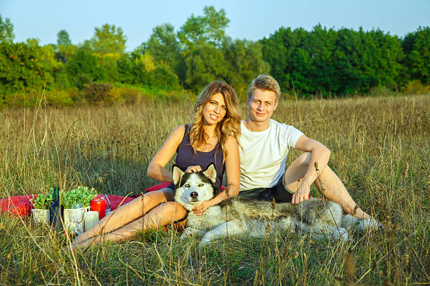 istock Lovely young beautiful couple resting in park 519869548