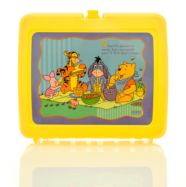 Winnie the Pooh Lunch Box Winneconne, WI, USA - 6 April 2016:  Plastic lunch box featuring Winnie the Pooh on an isolated background. winnie the pooh photos stock pictures, royalty-free photos & images