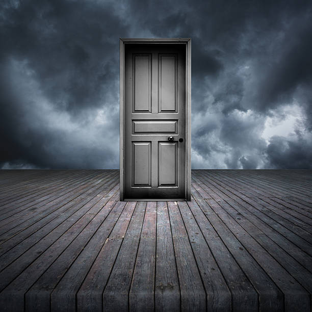 istock Closed door outdoor a stormy day 519872540