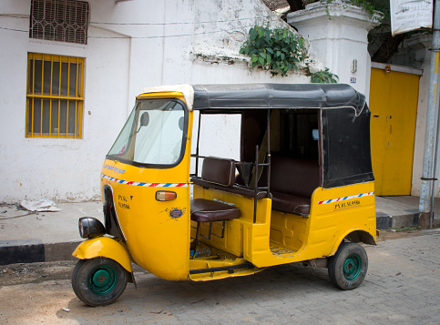 Pondicherry, India - October 12, 2014: Auto rickshaw or tuk-tuk on the street  in Pondicherry also known as Puducherry, India.