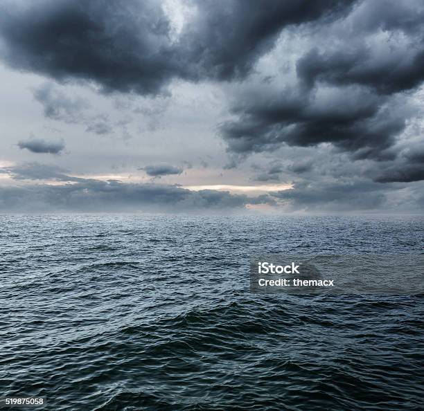 Stromy Clouds And Sea Stock Photo - Download Image Now - Sea, Beauty, Beauty In Nature