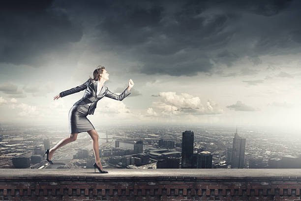 istock Running businesswoman 519887617