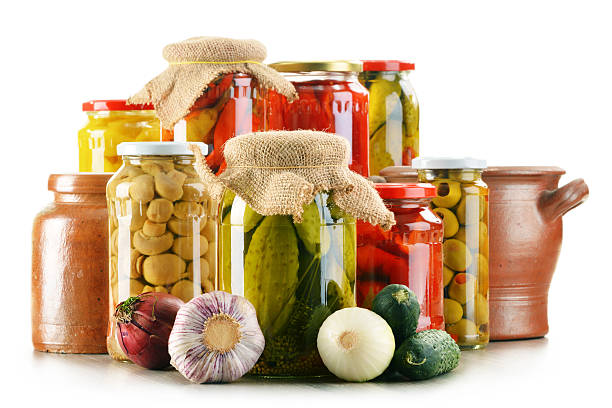 istock Composition with jars of pickled vegetables. Marinated food 519888441