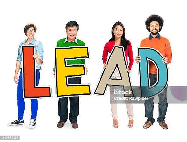 Multiethnic Group Of People Holding Word Lead Stock Photo - Download Image Now - Active Seniors, Asian and Indian Ethnicities, Business