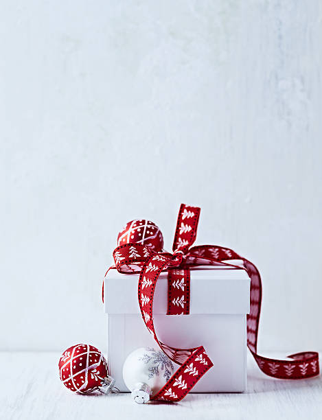 istock White Christmas Gift with Red Ribbon 519890781