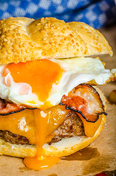 istock Homemade burger with fried egg and spicy fries 519891081