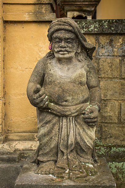 istock Traditional guard statue carved in stone on Bali island 519891642