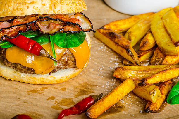 istock Homemade chilli burger with home spicy fries 519892477