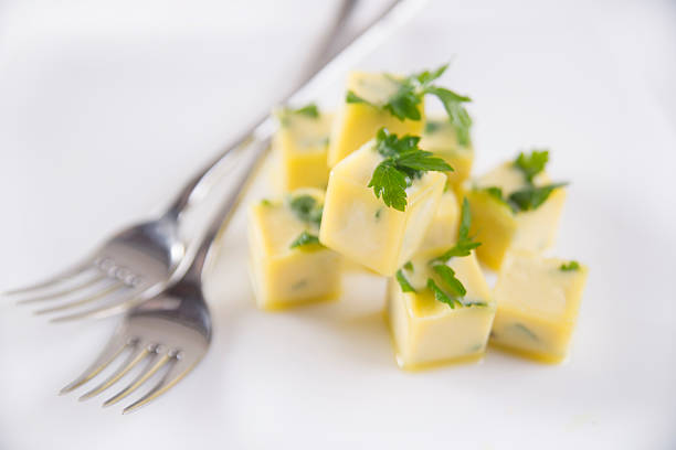 Hand Holding Cheese Plate over table