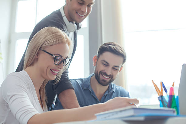 istock Talented young colleagues are working in cooperation 519893490