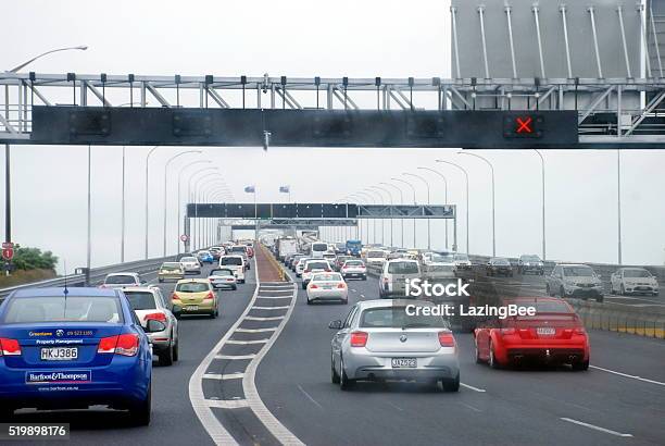 Traffic On Auckland Harbour Bridge New Zealand Stock Photo - Download Image Now - Auckland Harbour Bridge, Auckland, Multiple Lane Highway