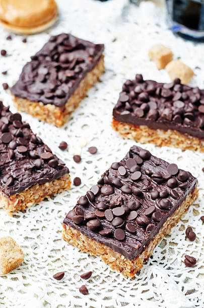 istock raw vegan dates oats peanut butter bars with chocolate frosting 519898436