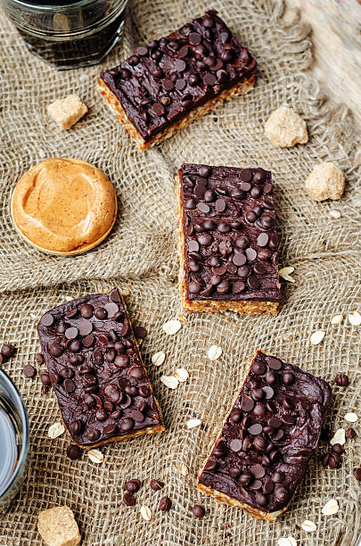 istock raw vegan dates oats peanut butter bars with chocolate frosting 519898442