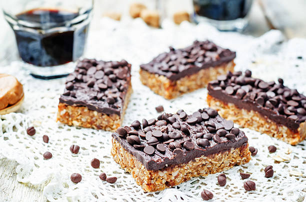 istock raw vegan dates oats peanut butter bars with chocolate frosting 519898460