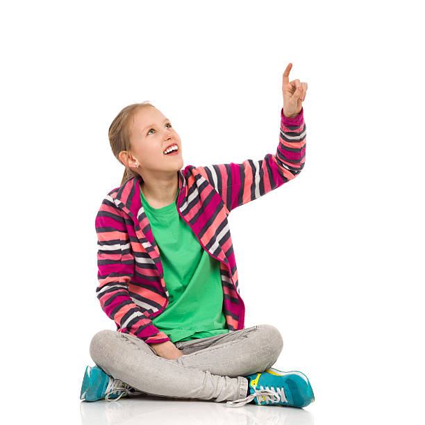 istock Blong Girl Pointing Up 519898884
