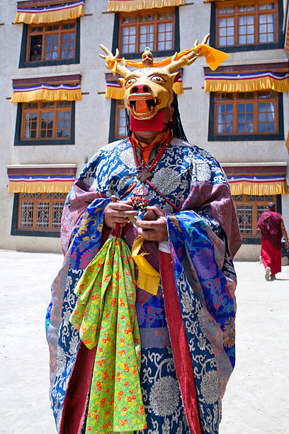 Cham Dance in Lamayuru Gompa in Ladakh, North India Lamayuru, India - June 17, 2012: Buddhist monk in Deer mask dancing Cham mystery during Yuru Kabgyat festival at Lamayuru Gompa in Ladakh, Jammu and Kashmir, North India cham mask stock pictures, royalty-free photos & images