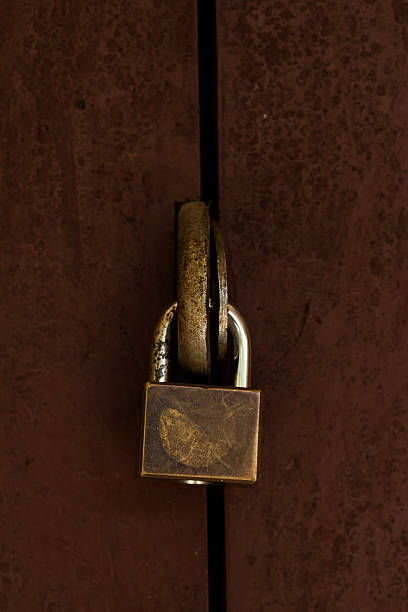 istock locked old wooden door. 519912823