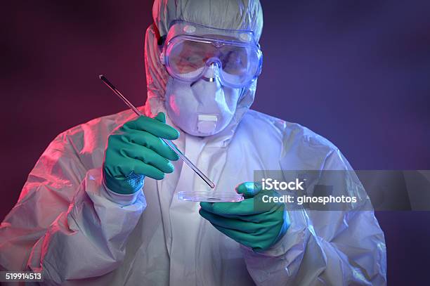 Scientist Working With Virus Stock Photo - Download Image Now - Adult, Bacterium, Clean Suit