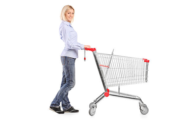 istock Woman pushing a shopping cart 519915135