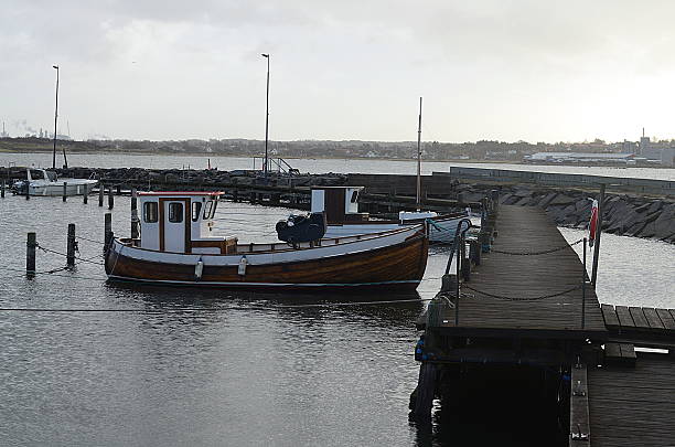 istock boats at a small port in sweden 519916264
