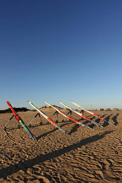 Hang gliders Hang gliders lined up ready for rental  para ascending stock pictures, royalty-free photos & images
