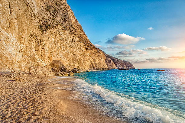istock Beautiful Sunset on Rocky Coastline and Beach 519916667