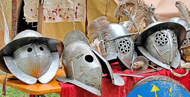 istock helmets of ancient Roman origin and medieval helmets 519916749
