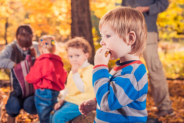istock family picnic at fall forest 519917365