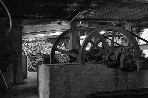 istock rusty machinery in abandoned factory 519917465