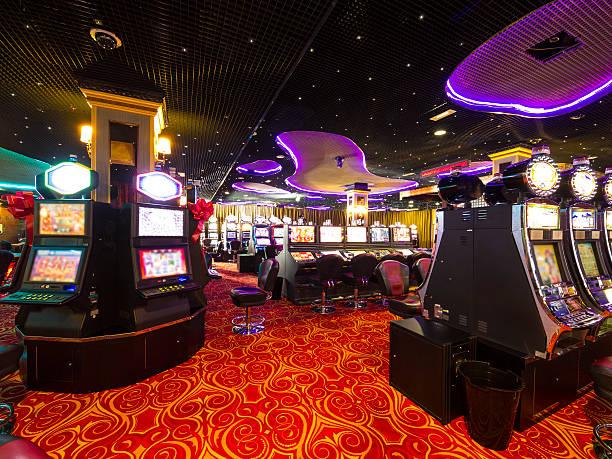 Casino at wait A Slot machines room in an empty  Casino. casino night stock pictures, royalty-free photos & images