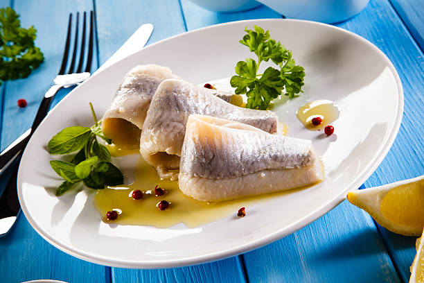 Marinated herring fillets stock photo