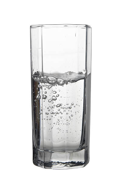 istock Water with air bubbles in a tall glass isolated 519921868