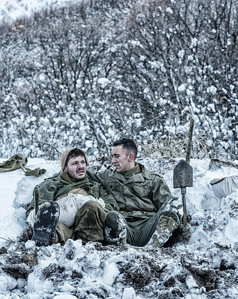 istock WWII US Army Soldier Buddies Serious Advice Conversation In Foxhole 519925068