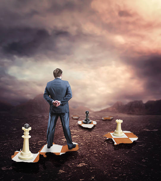 istock Businessman on the chess board 519925686