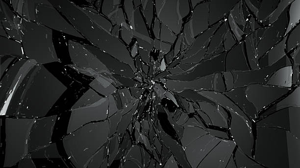 istock Pieces of broken and cracked glass on black 519925870