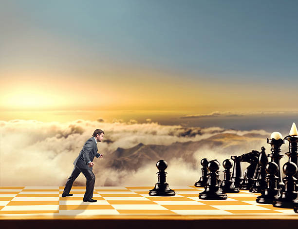istock Businessman on the chess board 519926454