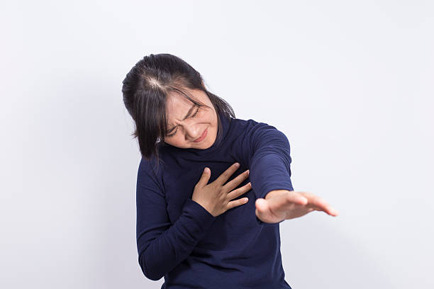 istock Health Care: Woman has chest pain 519926628