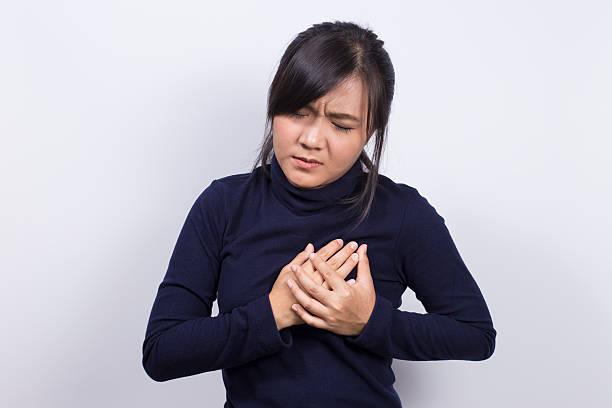 istock Health Care: Woman has chest pain 519926906