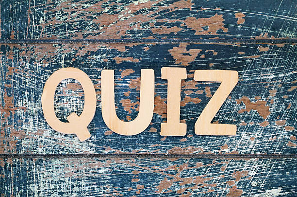 istock Word quiz written with wooden letters on rustic surface 519927232