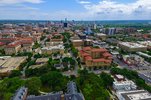 Colorful Spring Time Austin Over University of Texas UT Tower. 2016. The Ut Tower stands in front of the Austin Skyline Cityscape background. Colorful buildings all around a real gorgeous site above the Capital City of Austin Texas. 