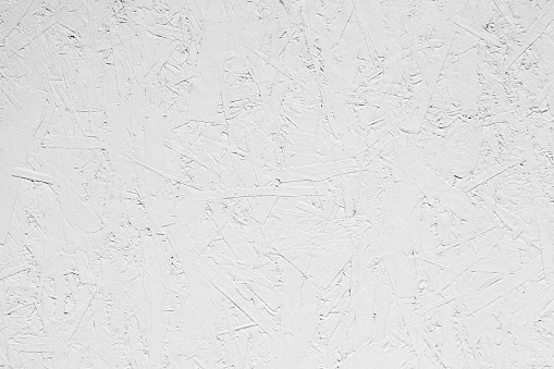 White grungy painted wooden plywood wall. Background photo texture