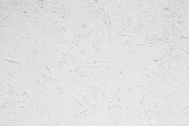 White grungy painted wooden plywood wall White grungy painted wooden plywood wall. Background photo texture pressboard stock pictures, royalty-free photos & images