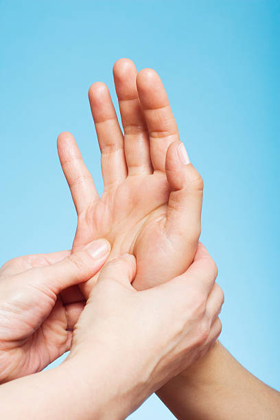 istock Woman having hand massage, close-up 519935411
